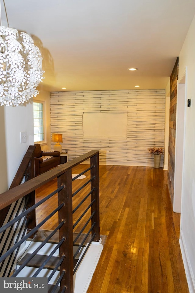 12507 Greenly St, Silver Spring, MD 20906 - hall with an upstairs landing, wood finished floors, recessed lighting, and a chandelier