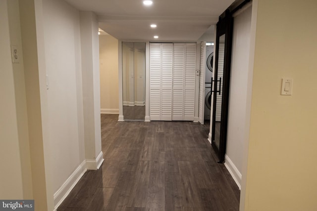 12507 Greenly St, Silver Spring, MD 20906 - hall with stacked washer / dryer, recessed lighting, dark wood finished floors, and baseboards