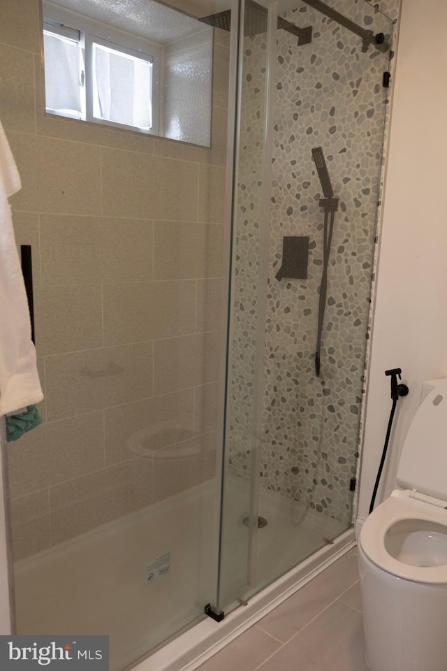 12507 Greenly St, Silver Spring, MD 20906 - bathroom featuring a stall shower, toilet, and tile patterned floors