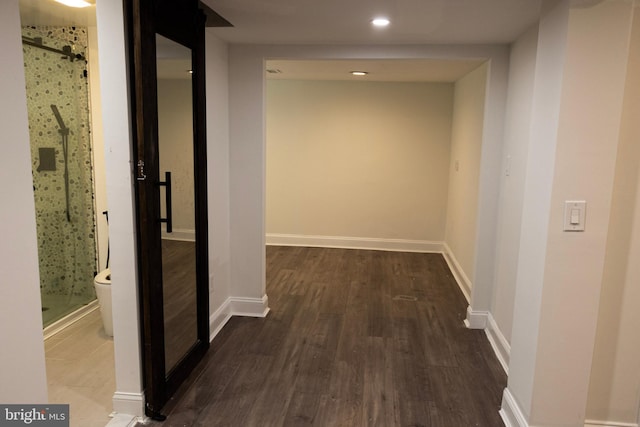 12507 Greenly St, Silver Spring, MD 20906 - hall featuring wood finished floors, a barn door, recessed lighting, and baseboards