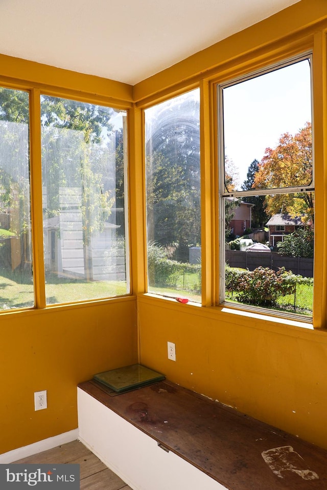 12507 Greenly St, Silver Spring, MD 20906 - unfurnished sunroom featuring baseboards
