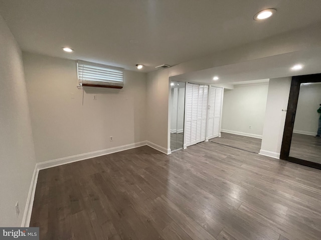 12507 Greenly St, Silver Spring, MD 20906 - finished basement with wood finished floors, baseboards, and recessed lighting