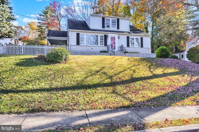 front facade featuring a front lawn