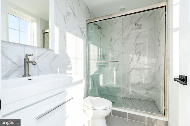 bathroom with decorative backsplash, vanity, toilet, and walk in shower