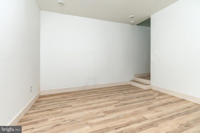 unfurnished room featuring light wood-type flooring