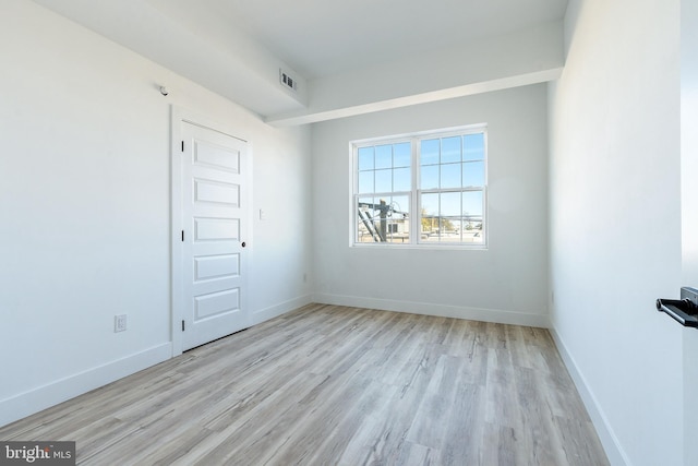 empty room featuring light wood-type flooring