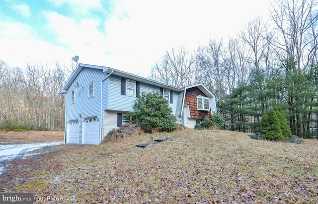 view of front of property with a garage