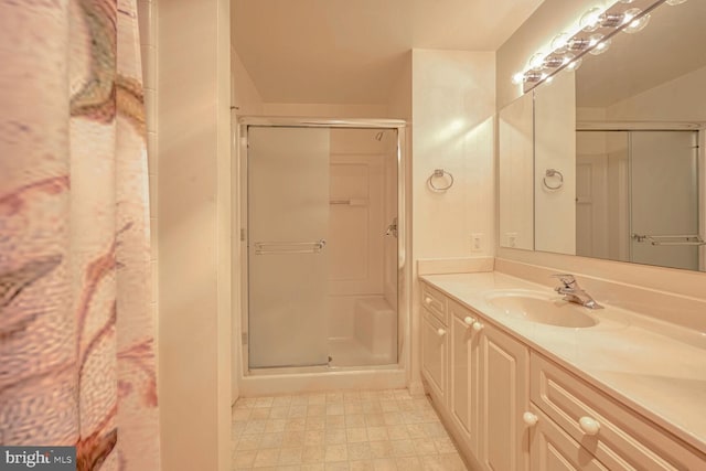 bathroom with vanity and an enclosed shower