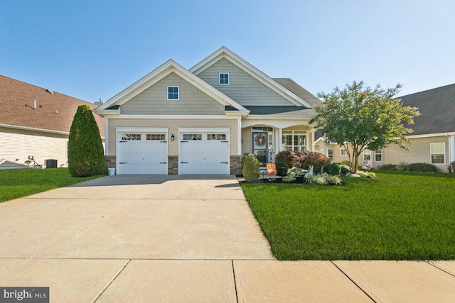 craftsman inspired home featuring central AC, a front lawn, and a garage