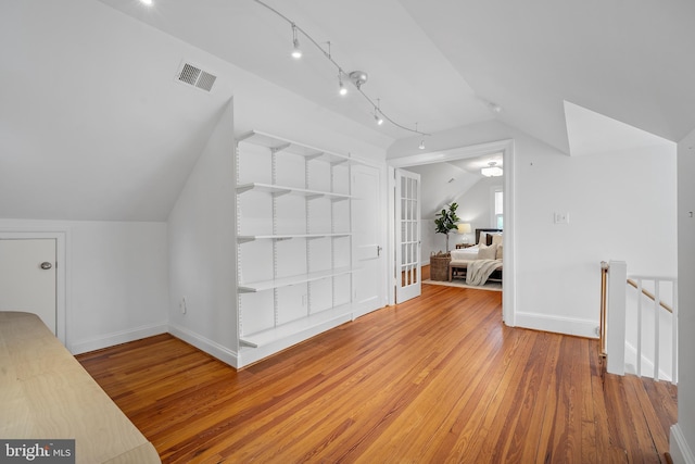 4619 Langdrum Ln, Chevy Chase, MD 20815 - bonus room with visible vents, wood-type flooring, baseboards, and vaulted ceiling