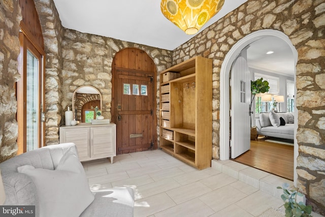 4619 Langdrum Ln, Chevy Chase, MD 20815 - entrance foyer with arched walkways and tile patterned floors