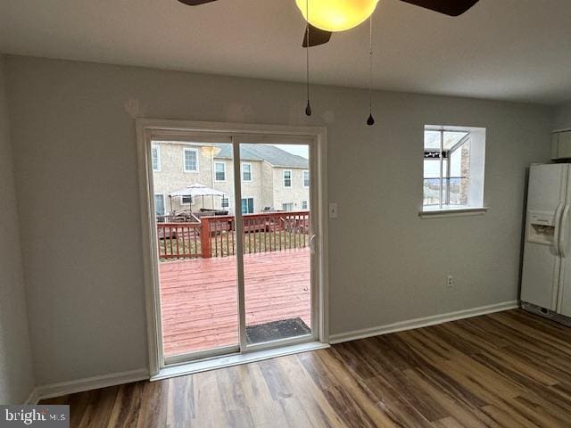 interior space with ceiling fan and hardwood / wood-style flooring