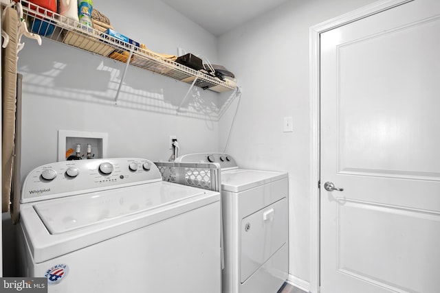 laundry area featuring independent washer and dryer