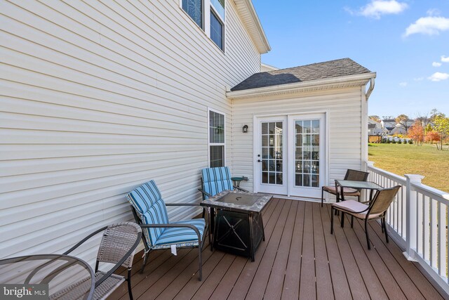 deck with a fire pit