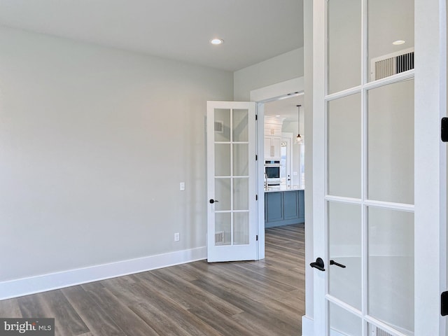76 Long Ln, Kirkwood, PA 17536 - empty room with french doors, baseboards, visible vents, recessed lighting, and dark wood-type flooring