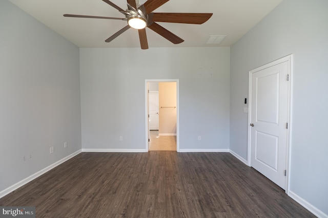 unfurnished bedroom featuring dark hardwood / wood-style flooring and ceiling fan