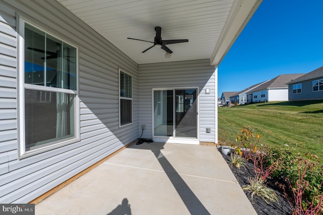 view of patio featuring ceiling fan