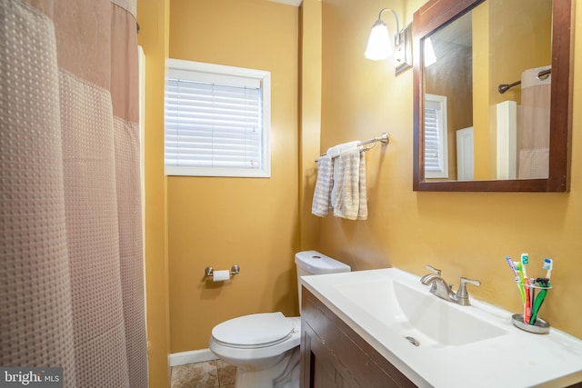 full bath featuring a shower with shower curtain, toilet, vanity, and tile patterned floors