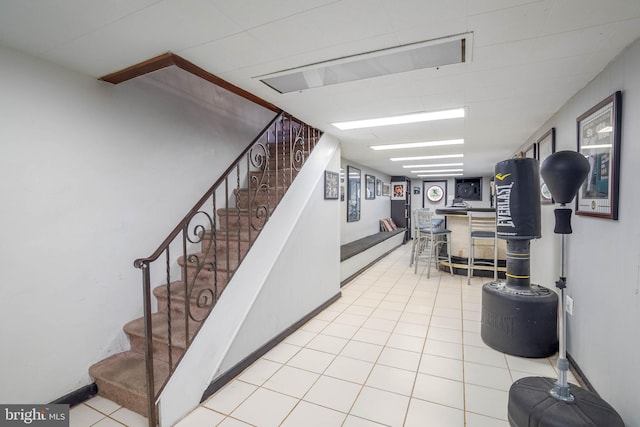 interior space with light tile patterned floors