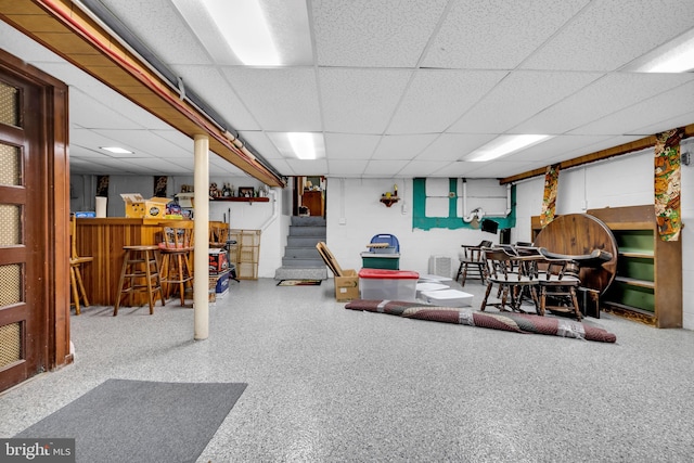 interior space featuring a paneled ceiling