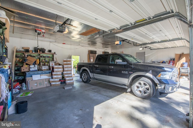 garage featuring a garage door opener