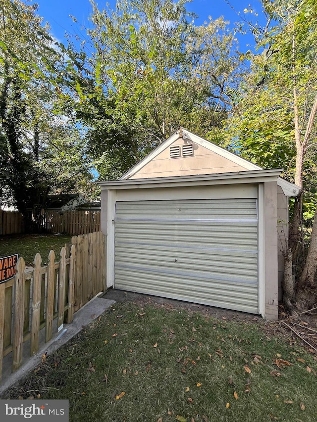 garage with a lawn