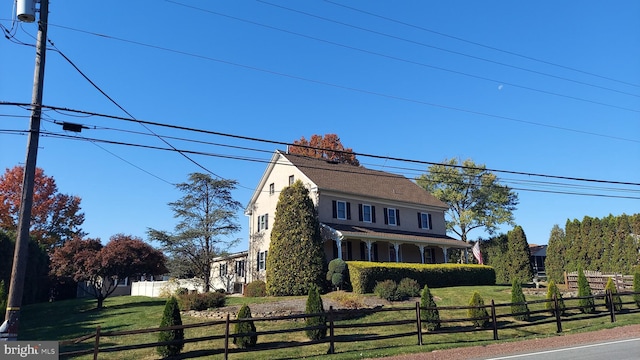 view of property exterior featuring a yard