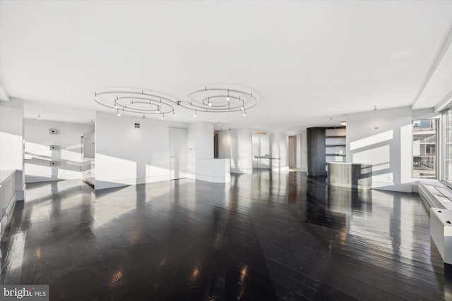 empty room featuring hardwood / wood-style flooring