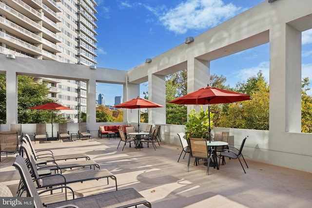 view of patio / terrace featuring a balcony