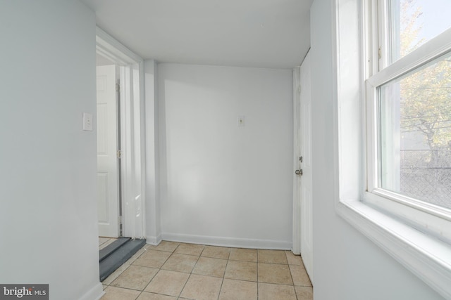 interior space featuring light tile patterned floors