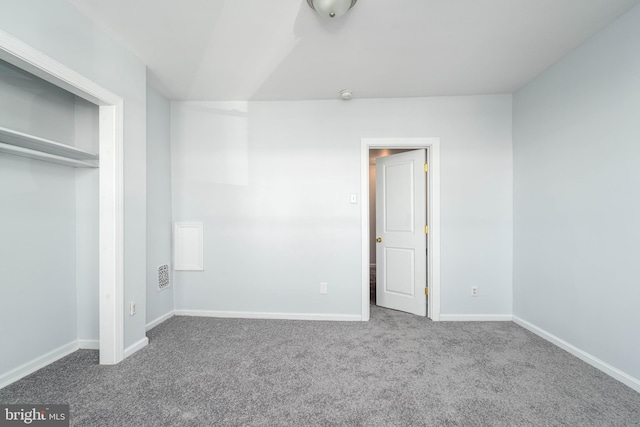 unfurnished bedroom with carpet floors