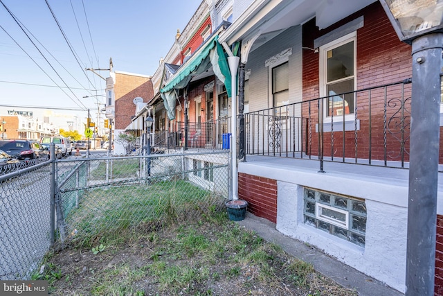 view of property exterior featuring covered porch