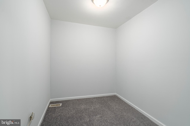 spare room featuring carpet flooring