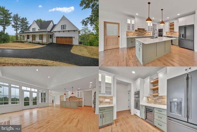 kitchen with backsplash, stainless steel appliances, decorative light fixtures, and an island with sink