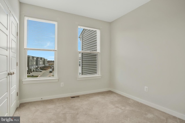 view of carpeted spare room