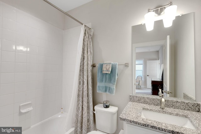 full bathroom featuring vanity, toilet, and shower / bath combo