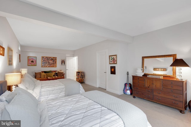 bedroom featuring light colored carpet