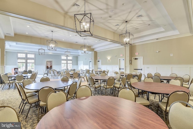 dining area with ornamental molding