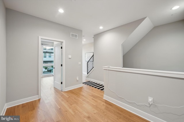 674 N 13th St, Philadelphia, PA 19123 - hallway featuring recessed lighting, light wood-type flooring, an upstairs landing, baseboards, and visible vents