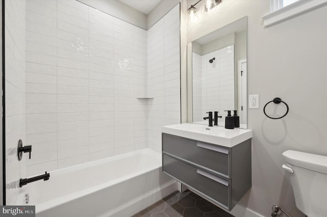 674 N 13th St, Philadelphia, PA 19123 - bathroom featuring vanity, toilet, baseboards, tub / shower combination, and tile patterned flooring
