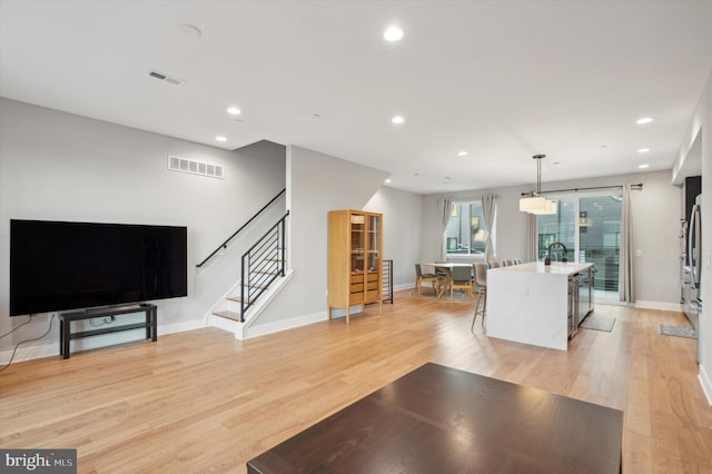 living room with light wood-type flooring