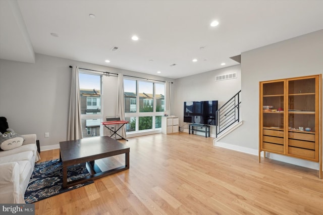 674 N 13th St, Philadelphia, PA 19123 - living area featuring visible vents, recessed lighting, light wood-style flooring, and stairs