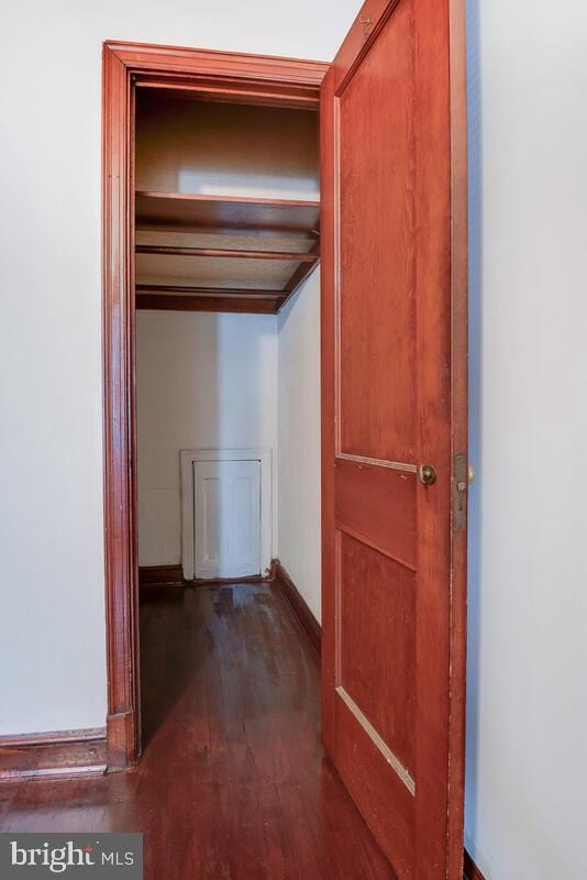 hall featuring dark hardwood / wood-style flooring