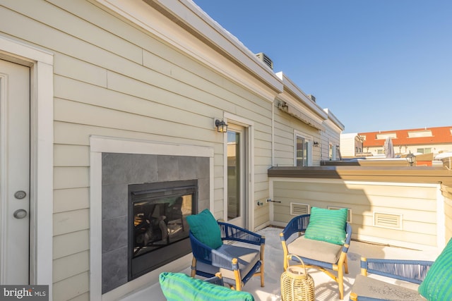 view of patio / terrace with a tiled fireplace