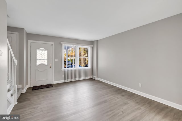 entrance foyer featuring hardwood / wood-style floors