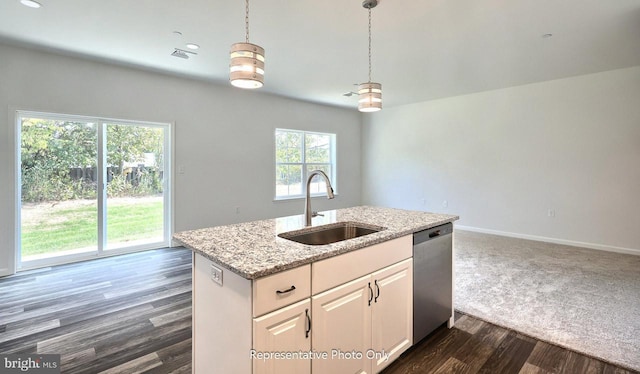 kitchen featuring white cabinets, dark wood-type flooring, sink, pendant lighting, and dishwasher