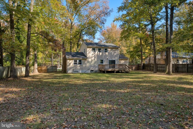 view of yard with a wooden deck