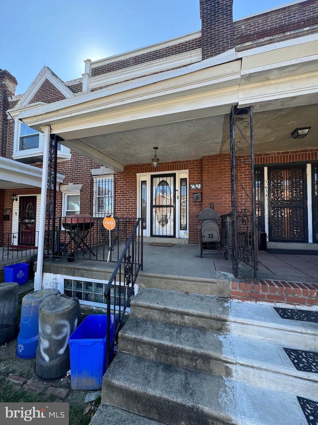 doorway to property featuring covered porch