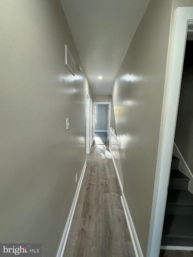 corridor featuring hardwood / wood-style flooring