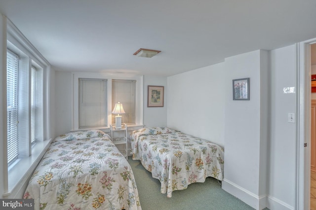 bedroom featuring carpet flooring